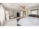 Spacious main bedroom with carpet, furniture, including vanity and full-length mirror at 1211 Whispering Oak Ln, Durham, NC 27704