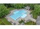 Aerial view of community pool with ample seating, lounge chairs and mature landscaping at 12504 Bayleaf Church Rd, Raleigh, NC 27614