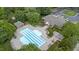 Aerial view of the community pool and clubhouse, showcasing the recreational amenities and landscaping at 12504 Bayleaf Church Rd, Raleigh, NC 27614