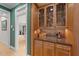 Butler's pantry with custom cabinets and granite countertops, perfect for entertaining guests at 12504 Bayleaf Church Rd, Raleigh, NC 27614