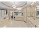 Luxurious bathroom showcasing a soaking tub, vanity with dual sinks, and decorative wallpaper at 12504 Bayleaf Church Rd, Raleigh, NC 27614