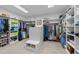 Walk-in closet with custom shelving, drawers, and ample storage for shoes and accessories at 12504 Bayleaf Church Rd, Raleigh, NC 27614