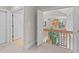 Hallway featuring an open view of the great room, balcony, and staircase at 12504 Bayleaf Church Rd, Raleigh, NC 27614