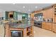 Gourmet kitchen island with granite countertops and professional-grade appliances for culinary convenience at 12504 Bayleaf Church Rd, Raleigh, NC 27614