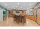 Open kitchen with an island, bar seating, custom cabinets, and recessed lighting throughout at 12504 Bayleaf Church Rd, Raleigh, NC 27614