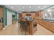 Spacious kitchen with eat-in island, abundant storage, and professional-grade appliances for culinary enthusiasts at 12504 Bayleaf Church Rd, Raleigh, NC 27614