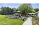 Community playground with slides, bike rack, and fenced perimeter offers a safe place for children to play at 12504 Bayleaf Church Rd, Raleigh, NC 27614