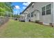 Wide view of backyard and home's deck, showing backyard's proximity to the residence at 1309 Caribou Xing, Durham, NC 27713