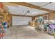 Spacious garage with ample storage space and a large overhead door at 1311 Theodore Ln, Durham, NC 27703