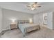 Serene main bedroom with neutral tones, ceiling fan and ensuite bathroom at 1311 Theodore Ln, Durham, NC 27703