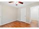Neutral bedroom featuring hardwood floors and closet at 14 Gloucester Ct, Durham, NC 27713