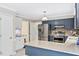 Modern kitchen features stainless steel appliances and stylish granite countertops at 14 Gloucester Ct, Durham, NC 27713
