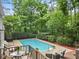Enjoy a large in-ground pool with plenty of seating and privacy at 14 Gloucester Ct, Durham, NC 27713