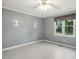 Bedroom featuring a gray color scheme, recessed lights, and natural light at 1420 Seabrook Ave, Cary, NC 27511