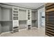 This walk-in closet features built-in drawers and shelves for organized storage at 1420 Seabrook Ave, Cary, NC 27511