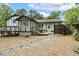 Charming exterior featuring the backyard and stone walkway at 1420 Seabrook Ave, Cary, NC 27511