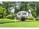 Charming two-story home with lush landscaping and manicured lawn, perfect for outdoor enjoyment at 1420 Seabrook Ave, Cary, NC 27511