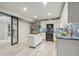 Charming kitchen with stainless steel appliances, a kitchen island, and a sliding glass door at 1420 Seabrook Ave, Cary, NC 27511