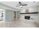 This living room features a brick fireplace, neutral paint, and an attached closet at 1420 Seabrook Ave, Cary, NC 27511
