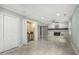 Bright living room with a brick fireplace, bar area, tile floors, and neutral paint at 1420 Seabrook Ave, Cary, NC 27511