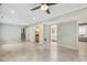 Spacious living room features stairs to the upper level, a bar, and a bathroom at 1420 Seabrook Ave, Cary, NC 27511