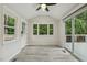 Bright sun room with hardwood floors, and natural light with access to the deck at 1420 Seabrook Ave, Cary, NC 27511