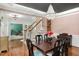 Elegant dining room featuring hardwood floors, a crystal chandelier, and stylish decor at 1603 Timber Wolf Dr, Durham, NC 27713