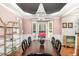 Elegant dining room featuring hardwood floors, a crystal chandelier, and stylish decor at 1603 Timber Wolf Dr, Durham, NC 27713