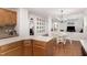 Well-equipped kitchen with ample countertop space, wood cabinets, and adjacent breakfast area at 1603 Timber Wolf Dr, Durham, NC 27713