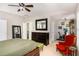 Spacious main bedroom with a vaulted ceiling, wooden furniture, and a separate exercise area for a balanced lifestyle at 1603 Timber Wolf Dr, Durham, NC 27713