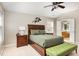 Serene main bedroom with a vaulted ceiling, traditional furnishings, and ensuite access to a private bathroom at 1603 Timber Wolf Dr, Durham, NC 27713