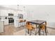 Open-concept kitchen with an island, and adjacent dining area providing a perfect space for entertaining at 18 Dot Dr, Wendell, NC 27591