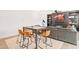 Open living space with modern decor, built-in shelving, a fireplace, and dining area seating at 18 Dot Dr, Wendell, NC 27591