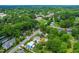 Neighborhood aerial view showcasing lush greenery, trees and quiet streets at 18 W Academy St, Wendell, NC 27591