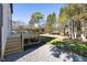 Large backyard featuring a wooden deck and a spacious grassy area at 18 W Academy St, Wendell, NC 27591