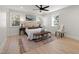 Serene bedroom with soft lighting, neutral decor, and large windows for natural light at 18 W Academy St, Wendell, NC 27591