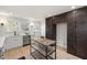 Well-lit kitchen with stainless steel appliances, updated cabinetry and kitchen island with seating at 18 W Academy St, Wendell, NC 27591