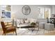 Bright living room with modern furniture, large windows, and stylish decor at 18 W Academy St, Wendell, NC 27591