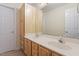 Bathroom featuring double sinks with extra cabinet and counter space at 1817 Foxbrook Dr, Raleigh, NC 27603