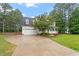 Charming two-story home with a well-maintained front yard and inviting curb appeal at 1817 Foxbrook Dr, Raleigh, NC 27603