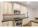 Stylish kitchen with stainless steel appliances and ample cabinet space at 1817 Foxbrook Dr, Raleigh, NC 27603