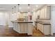 Spacious kitchen with island, stainless steel appliances, and pendant lighting at 1817 Foxbrook Dr, Raleigh, NC 27603