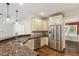 Beautiful kitchen with stainless steel appliances and granite countertops at 1817 Foxbrook Dr, Raleigh, NC 27603