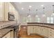 Well-equipped kitchen featuring modern appliances and ample counter space at 1817 Foxbrook Dr, Raleigh, NC 27603