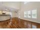 Bright living room with an abundance of natural light and hardwood floors at 1817 Foxbrook Dr, Raleigh, NC 27603