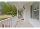 Inviting porch with a classic design and ample space for outdoor enjoyment at 1817 Foxbrook Dr, Raleigh, NC 27603