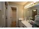 Bathroom with a shower/tub combo, vanity, and tile floors at 1910 Trexler Ct, Raleigh, NC 27606