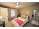 Bedroom with a ceiling fan, bed, and window at 1910 Trexler Ct, Raleigh, NC 27606