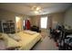 Comfortable bedroom offering ample space, neutral paint, and modern ceiling fan at 1910 Trexler Ct, Raleigh, NC 27606