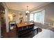 Inviting dining room complemented by a large window and access to kitchen at 1910 Trexler Ct, Raleigh, NC 27606